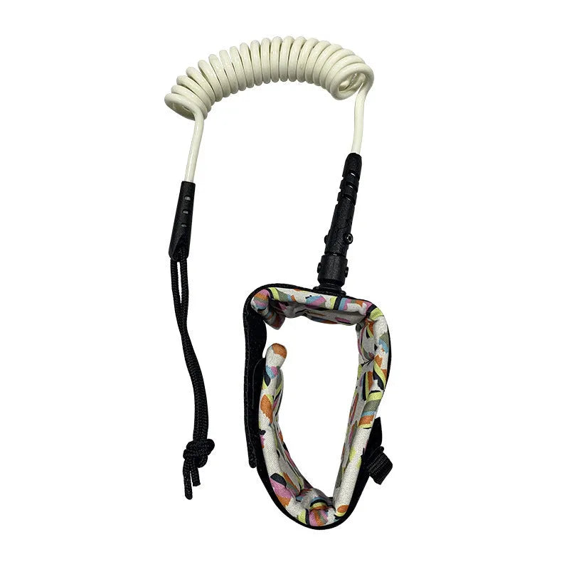 Surfboard hand holding rope made of beige pulp material coiled on a wooden surface