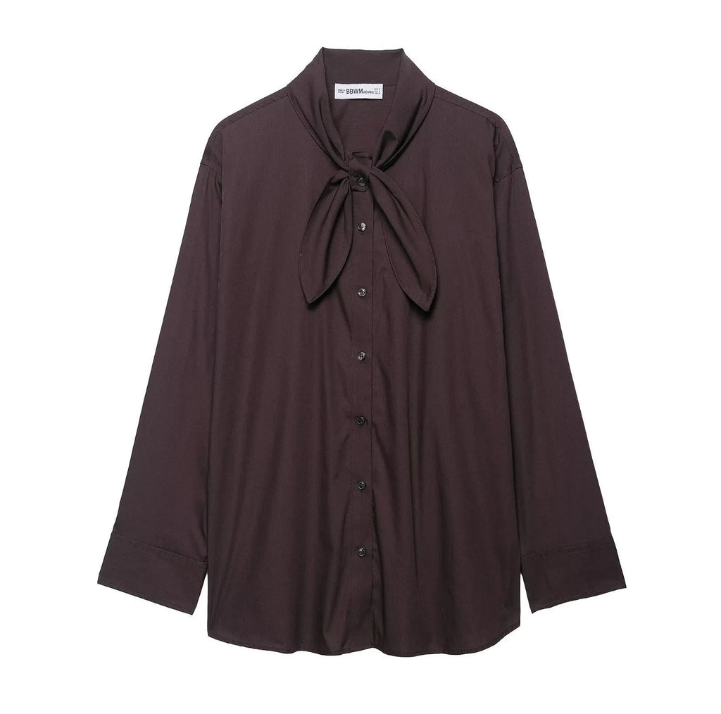 Women's brown loose-fit long sleeve poplin shirt with attached scarf bow tie, front view