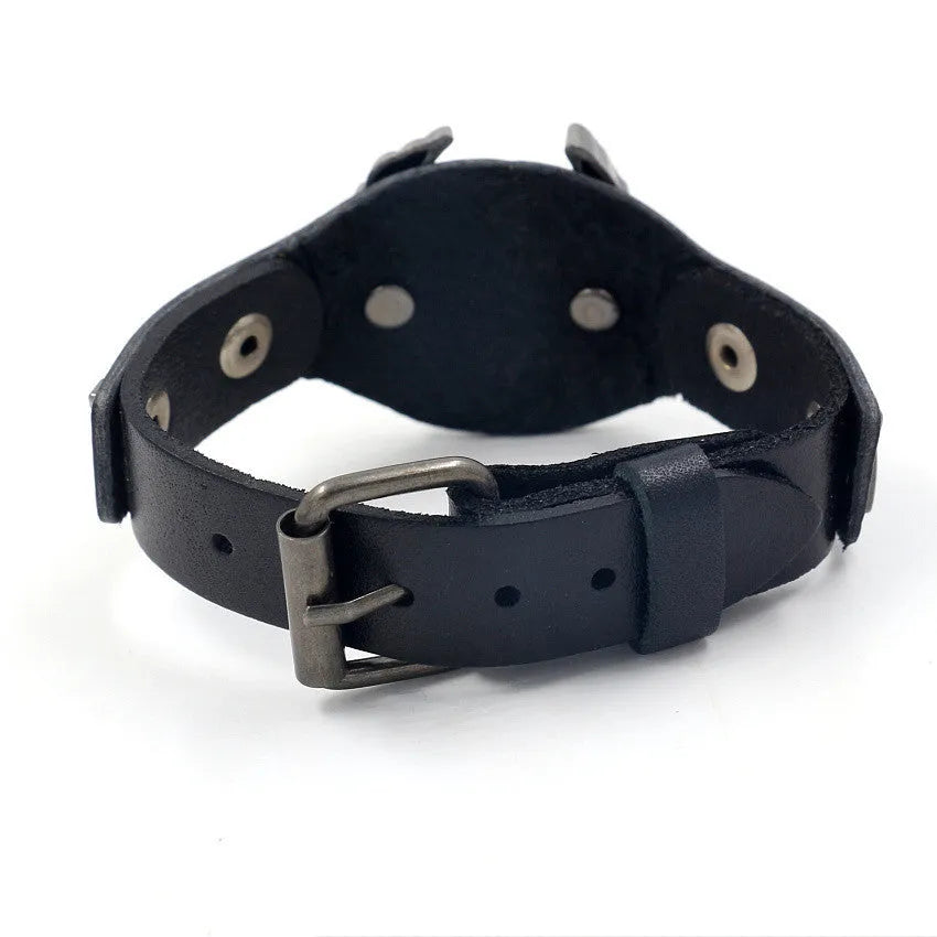 Black geometric leather bracelet with alloy eagle watch-button closure showing varying width from 1.7cm to 3.8cm