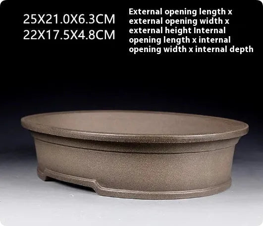 Handmade antique oval purple sand bonsai flower pot, 25cm long by 21cm wide.