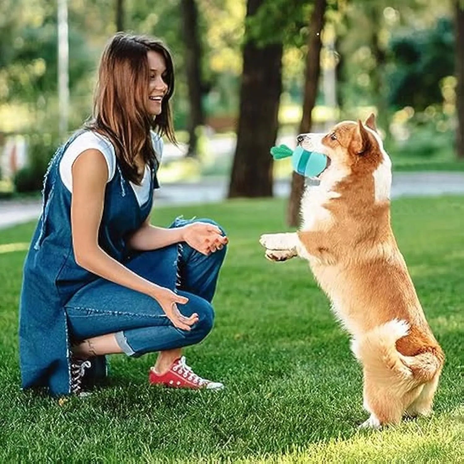Blue durable rubber interactive dog treat dispenser ball with tumbler design for medium large breeds