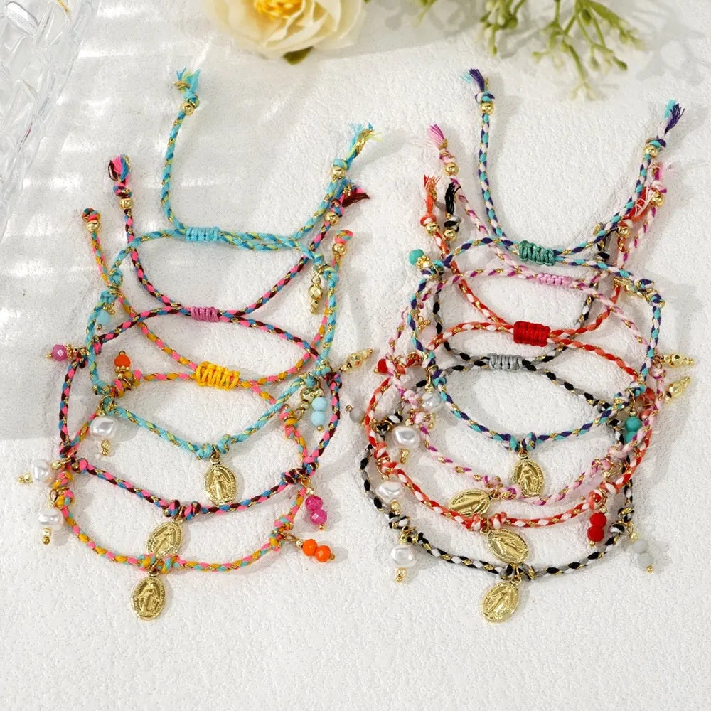 Close-up of hand-woven colourful braided rope bracelet with ethnic style and carrying strap tag function