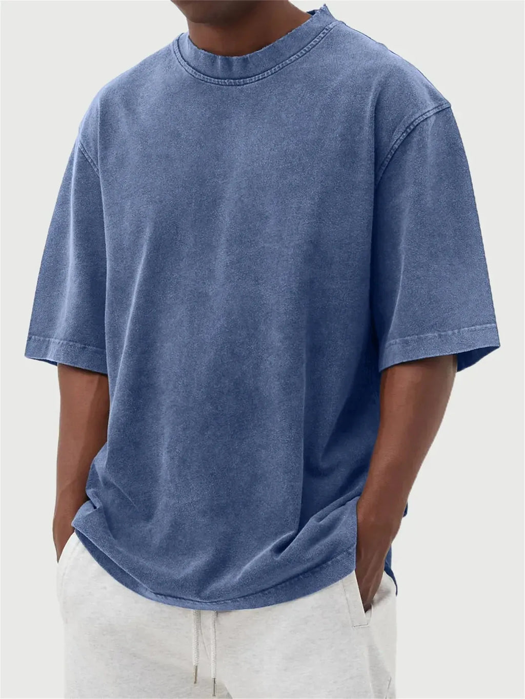 Men's stone-wash distressed pullover t-shirt in loose fit with half sleeves