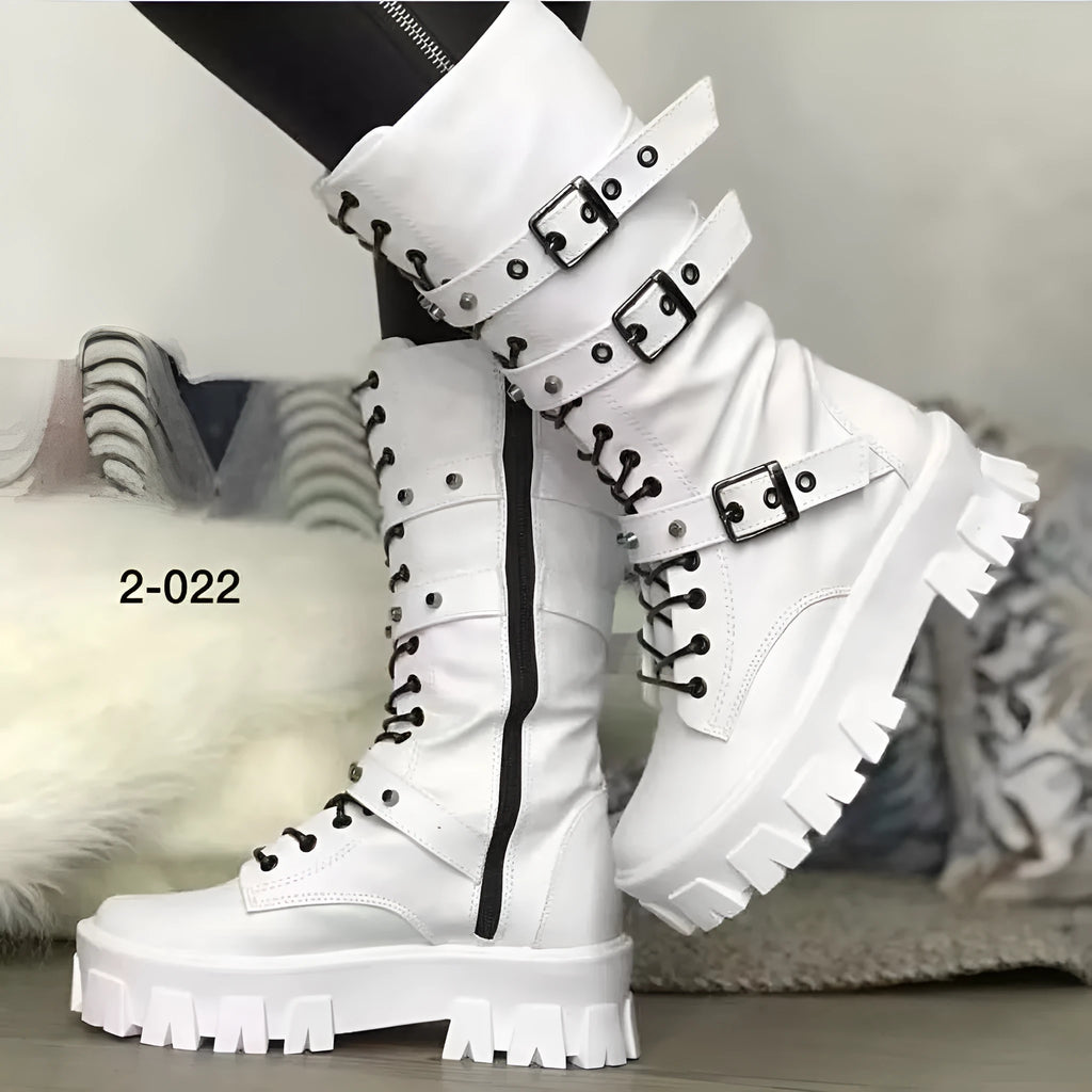 Black mid-calf women's boots with a prominent buckle detail and side zipper on a white background.