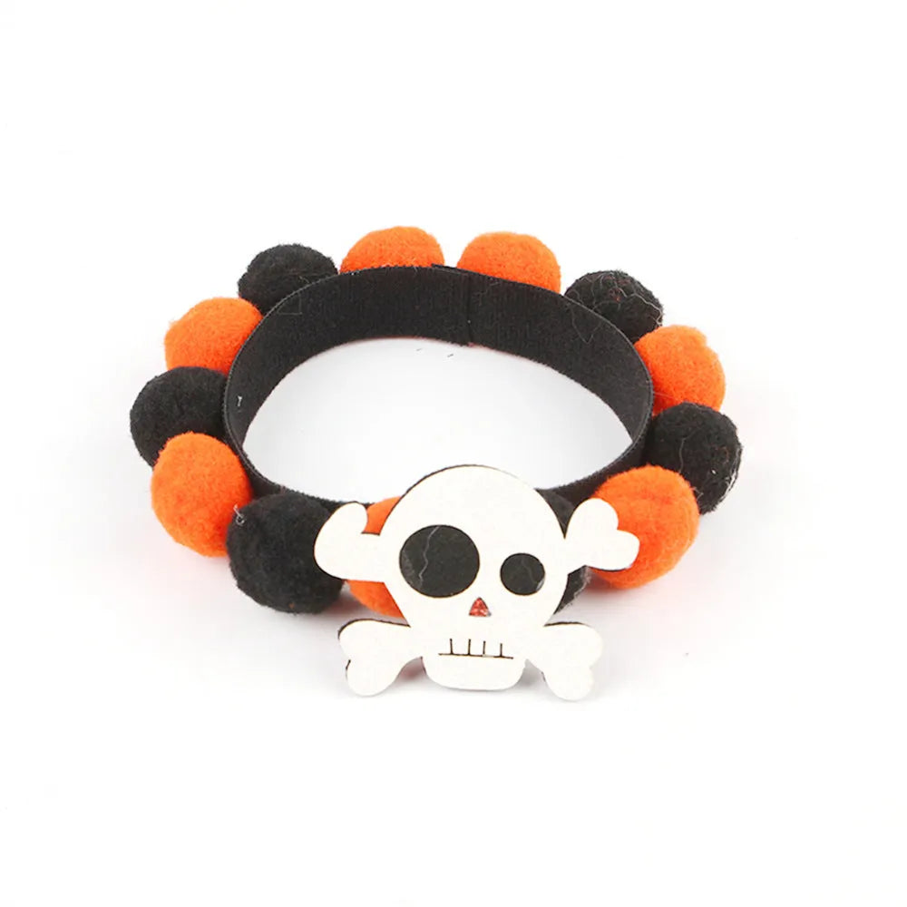 Halloween pet fur ball collar in pumpkin orange colour with fluffy ball on a black collar