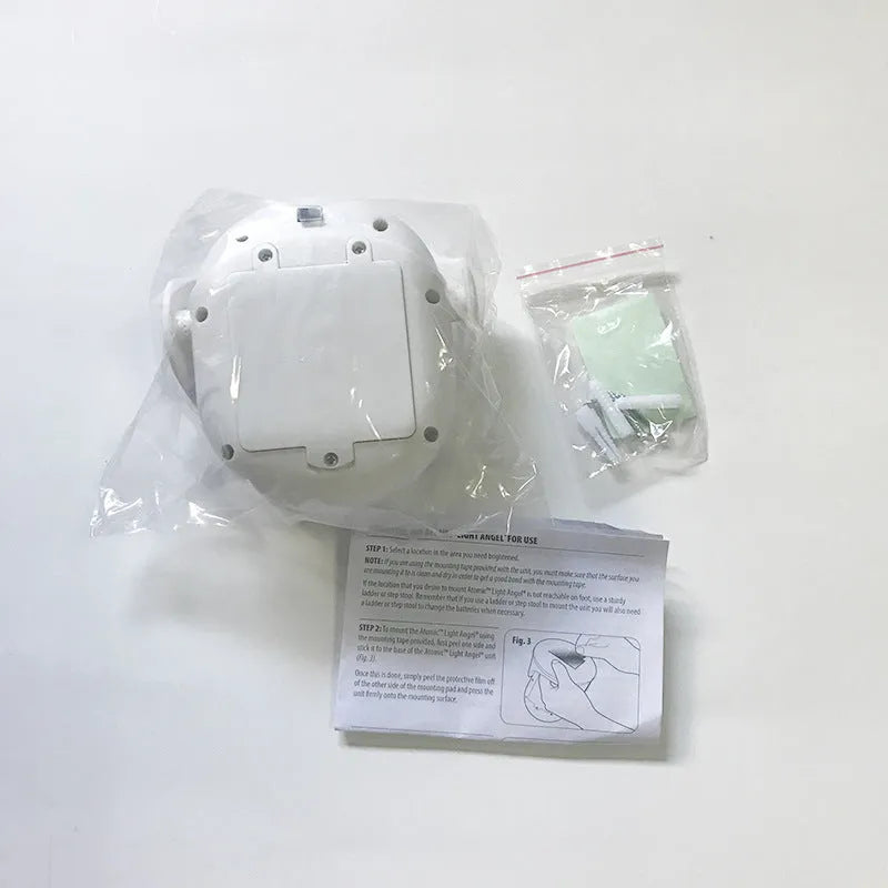White Atomic Angel LED induction light with compact ABS housing