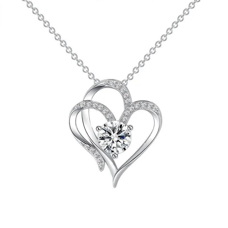 Women's sterling silver necklace with a heart-shaped pendant in rose gold, white gold, or yellow gold finish.