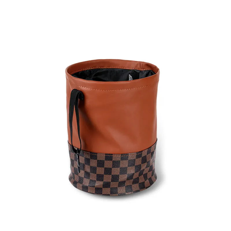 Brown leather retractable car rubbish bin with handle in expanded position
