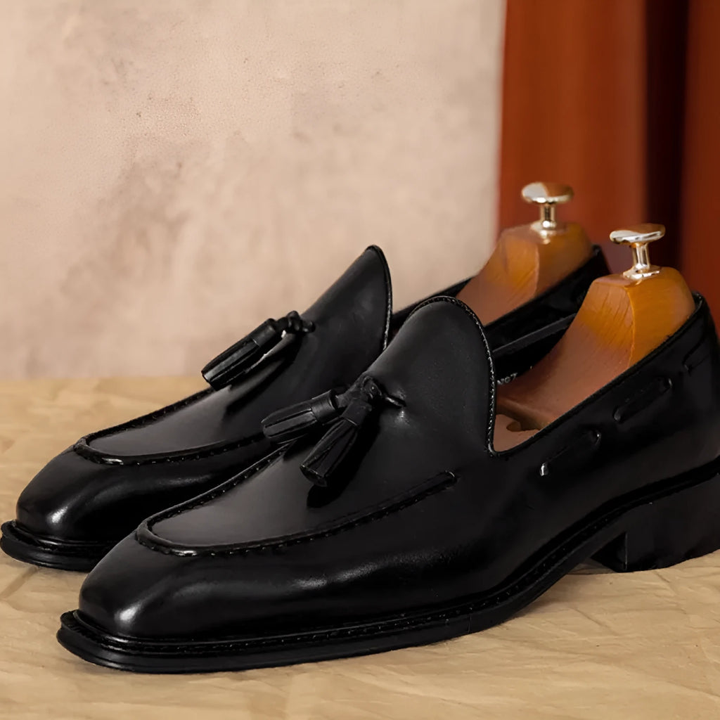 Men's black genuine leather slip-on loafers with rubber sole and British style design
