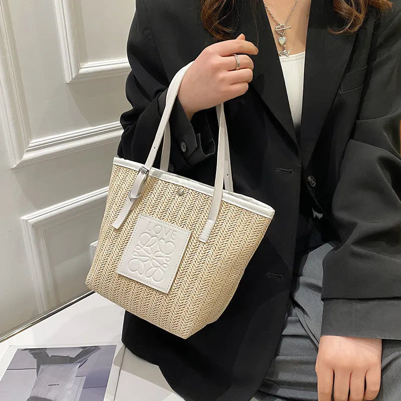 Women's woven straw shoulder bag with three-dimensional pocket in European American retro style