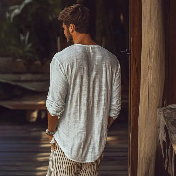 Beige V-neck long-sleeved slim fit T-shirt made from hemp-blend fabric.