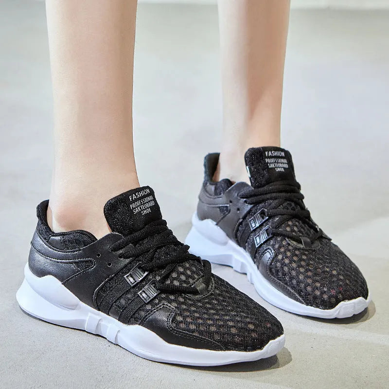 Low-top casual sneaker with hollow breathable mesh upper and round toe in a white net colour variant.