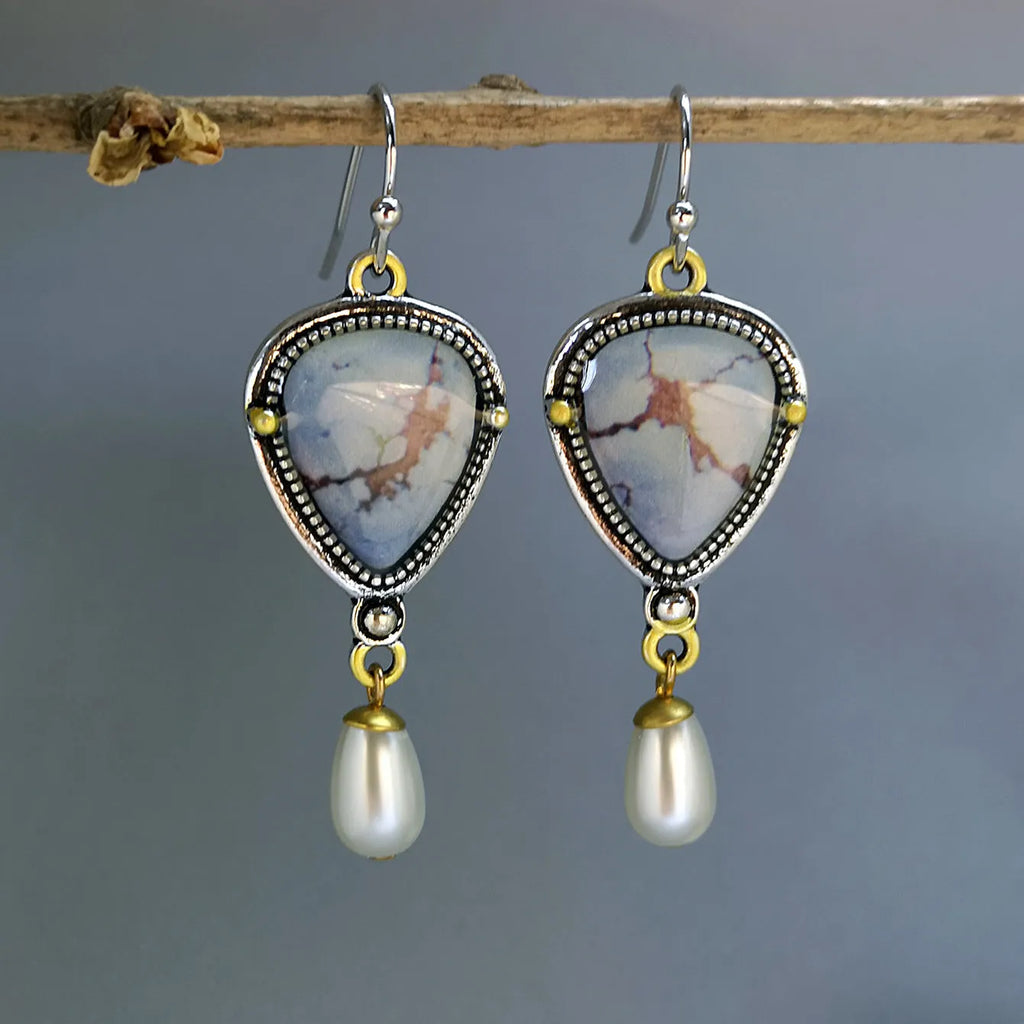 Retro blue drop earrings with synthetic opal and pearl on electroplated metal, 49mm long.