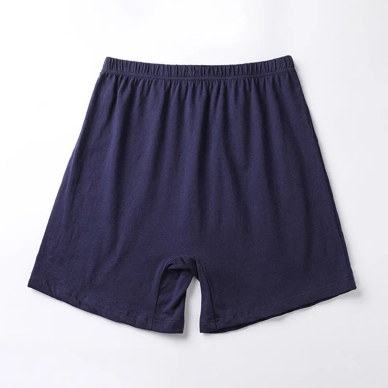 Men's solid colour modal boxer shorts in black, shown flat, highlighting the high-waisted design.