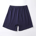 Men's solid colour modal boxer shorts in black, shown flat, highlighting the high-waisted design.