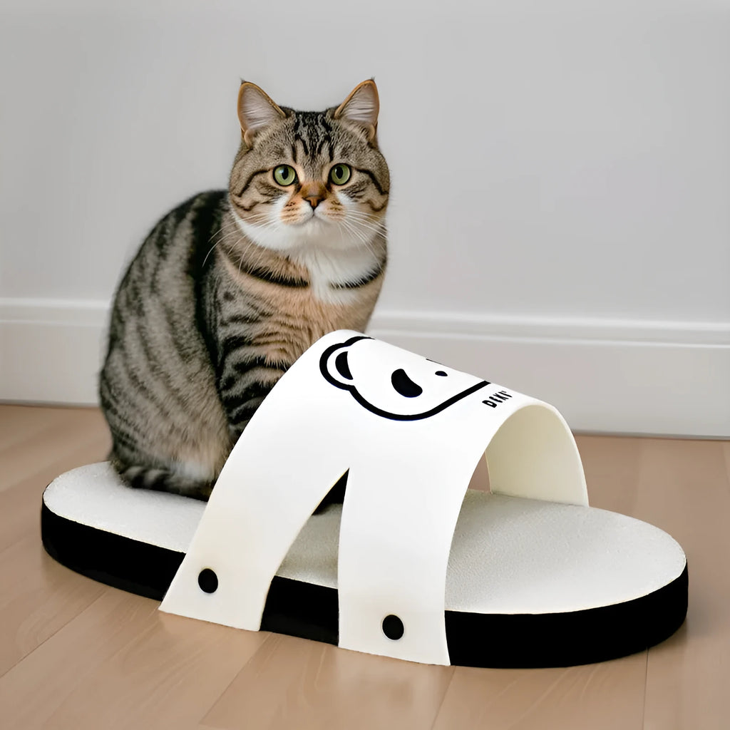 White corrugated paper cat scratch board with slipper design on flat surface