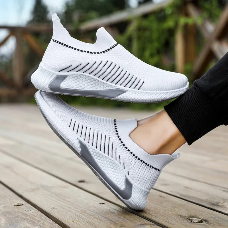 Men's striped mesh slip-on sneakers with lace-up front in black, white, and black/white colour options