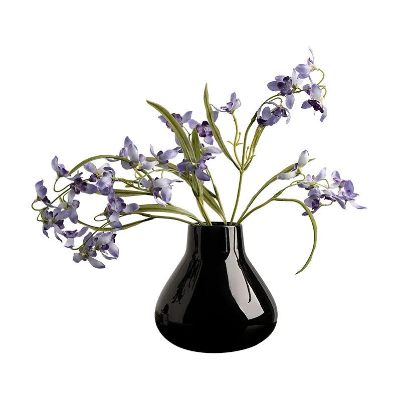 Round belly French design ceramic vase in coloured glaze finish with artificial orchid flowers