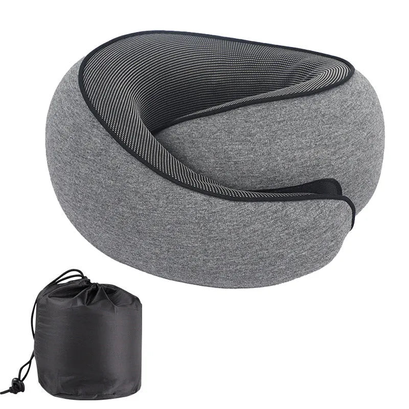 U-shaped memory foam travel neck pillow in grey with a storage bag.