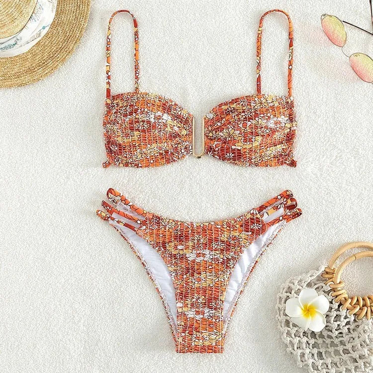 Women's floral bikini swimsuit in blue colour with high-waisted briefs style and nylon lining