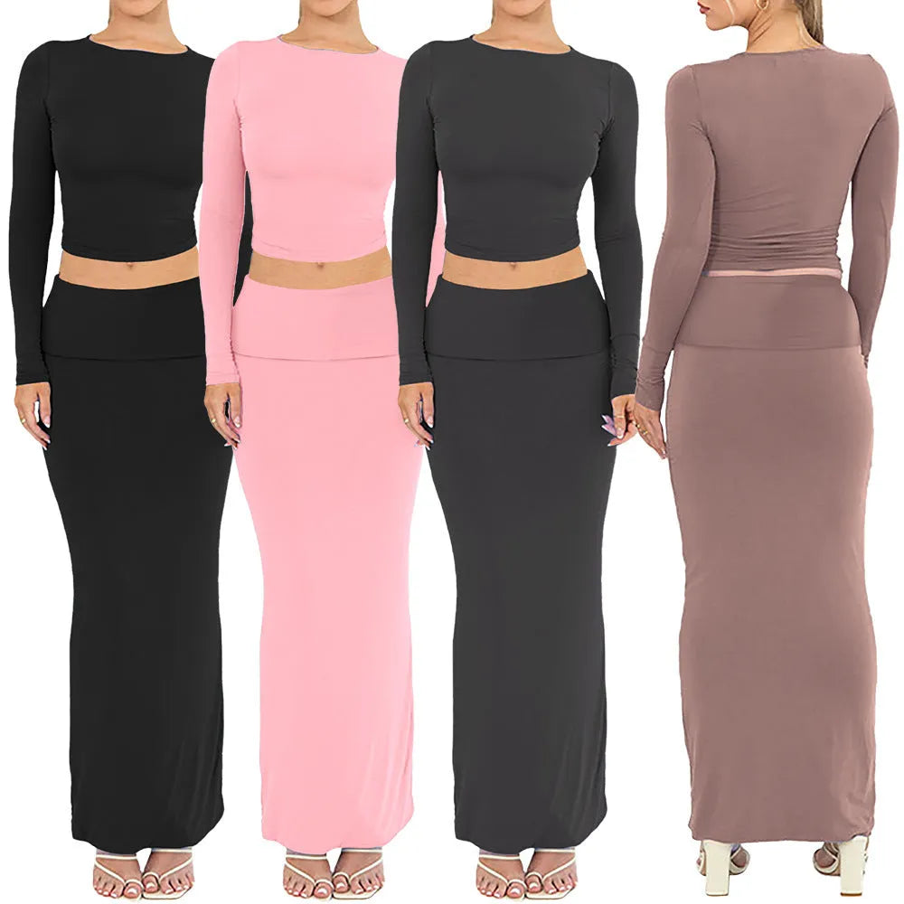 Women's autumn two-piece suit set showing top with three-quarter sleeves and matching long skirt