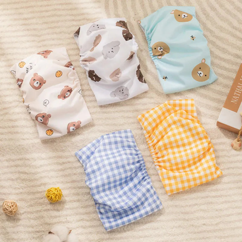 Reusable dog sanitary pant in cartoon print with fastener tape and elastic waistband for male dogs