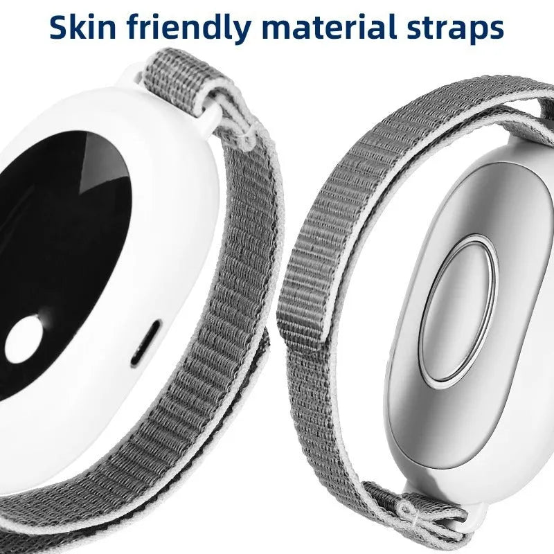 White sleep bracelet insomnia aid device with handheld remote control and USB charging cable