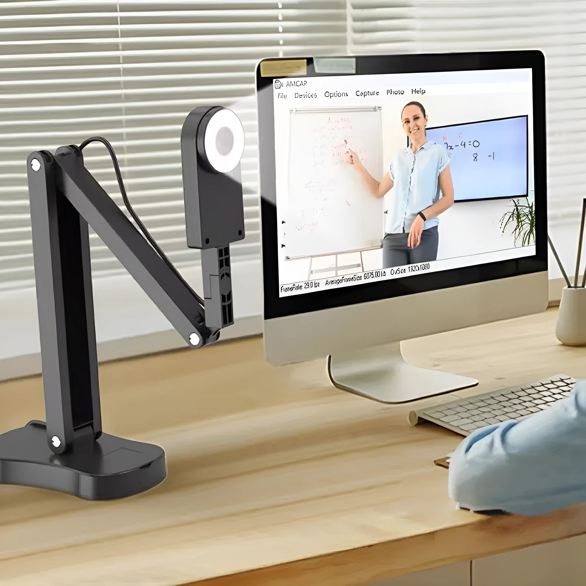 Black USB webcam with microphone for computer and mobile video calling, showing 8MP sensor and included data cable.