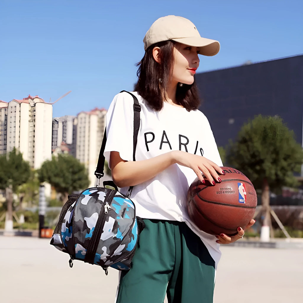 Black oxford cloth basketball training bag with 9L capacity showing one-shoulder carrying strap