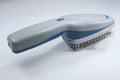 Pet ion comb with 78 teeth, 21.5cm length, removable brush head, and dual air purification for cats and dogs
