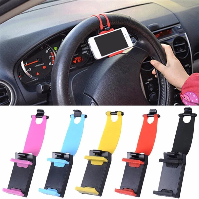 Black steering wheel phone clip holder mounted on car steering wheel