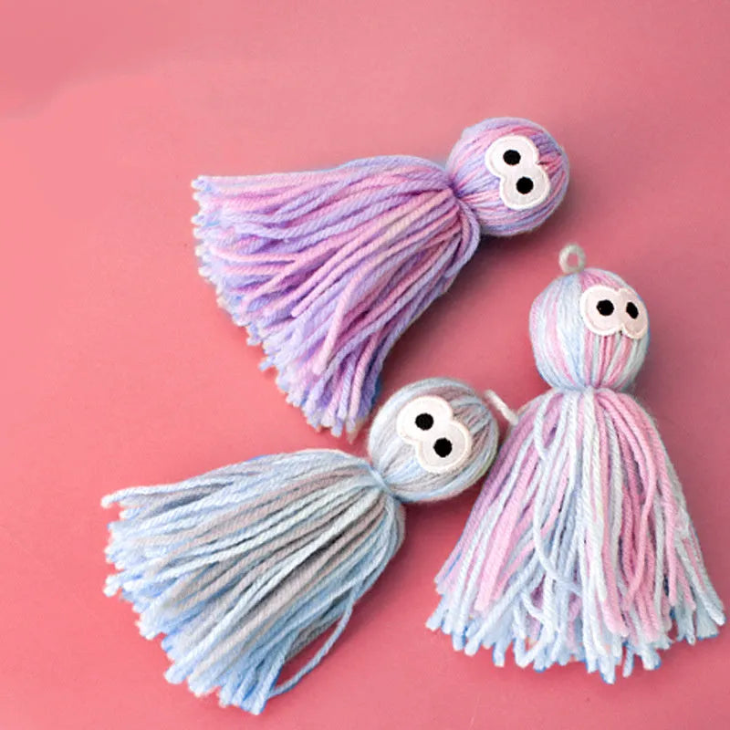 Cat toy set with four compressed wool balls and hanging teaser stick in blue grey colour combination