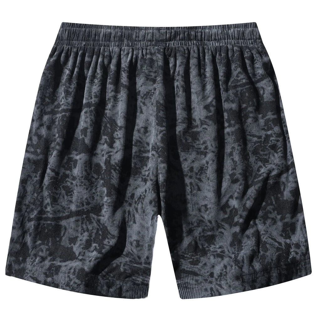 Men's black corduroy camouflage print athletic shorts with a high waist and straight-leg cut on a mannequin.