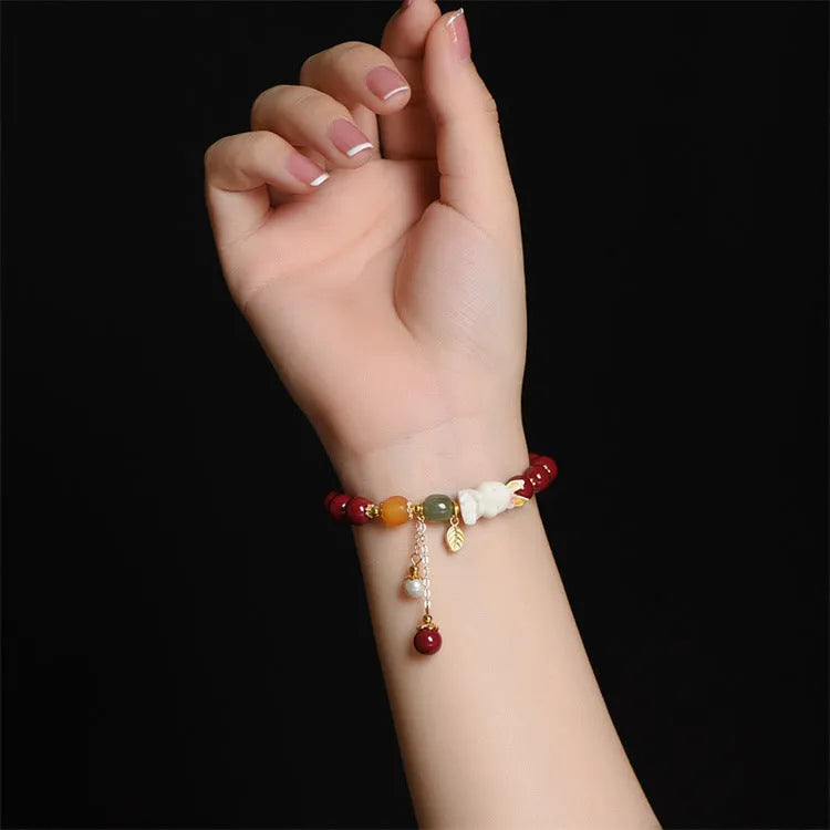 Tian Yu natural cinnabar bracelet with bunny rabbit design, 8mm or 10mm beads for women