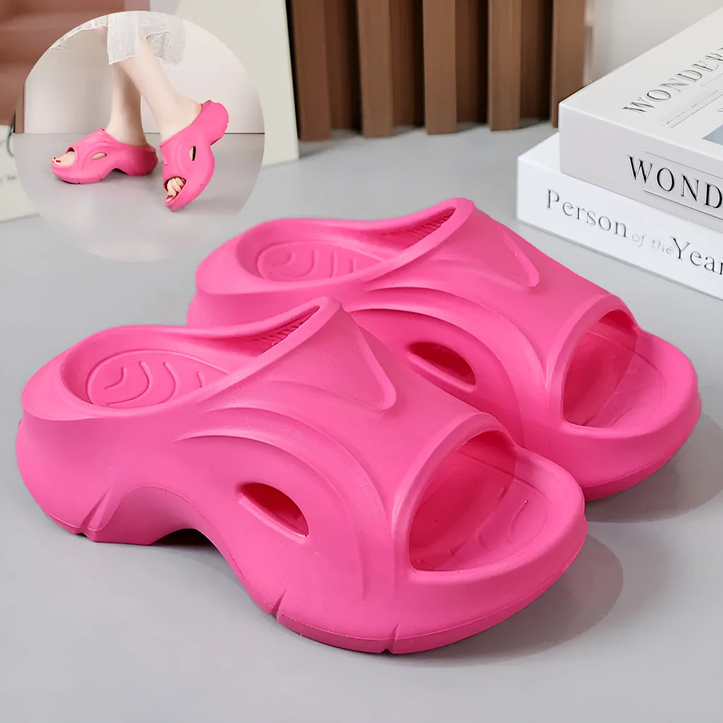 Women's thick-soled EVA slippers in rose red colour with round toe.
