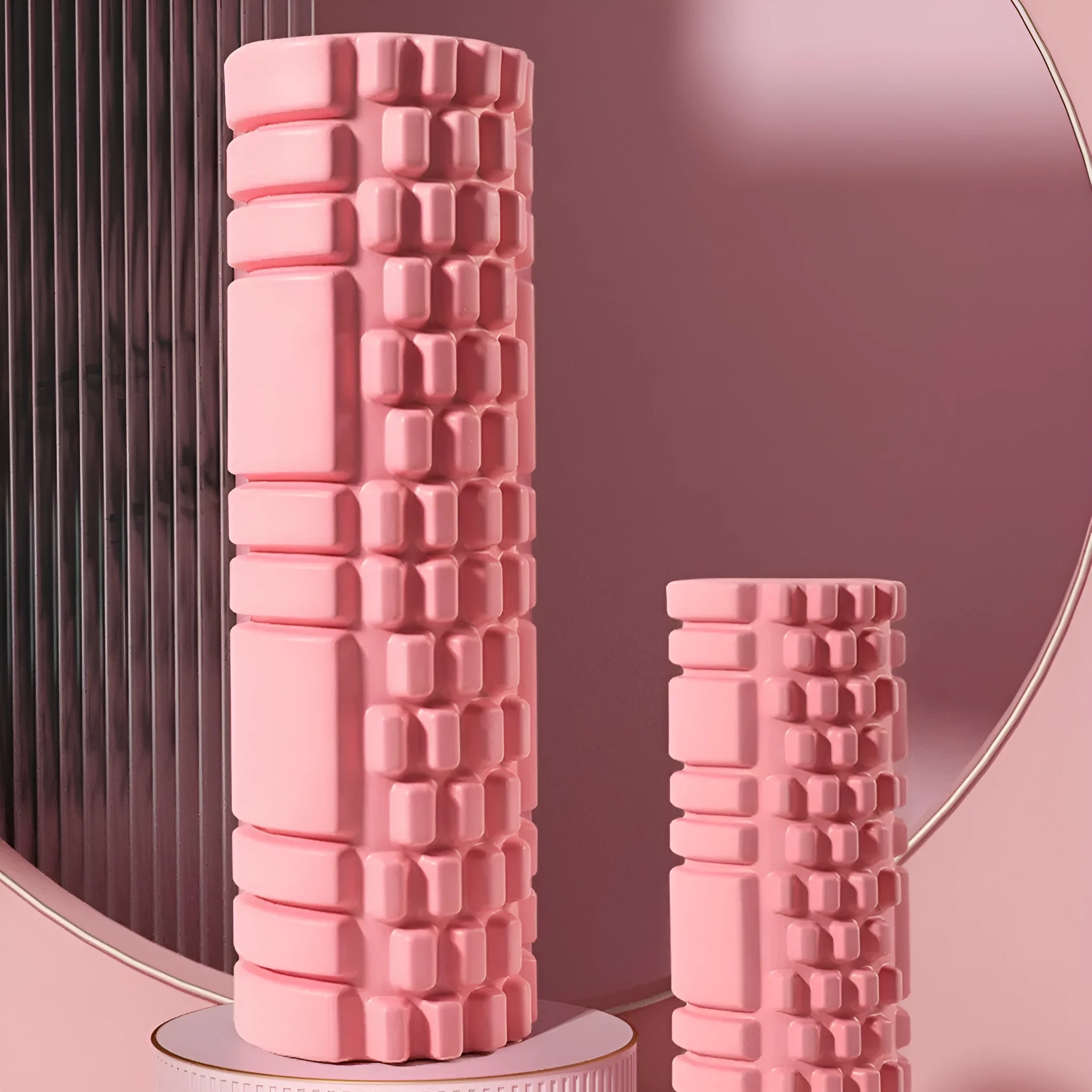 EVA foam roller for fitness recovery in black, shown beside colour options including grey, pink and sky blue