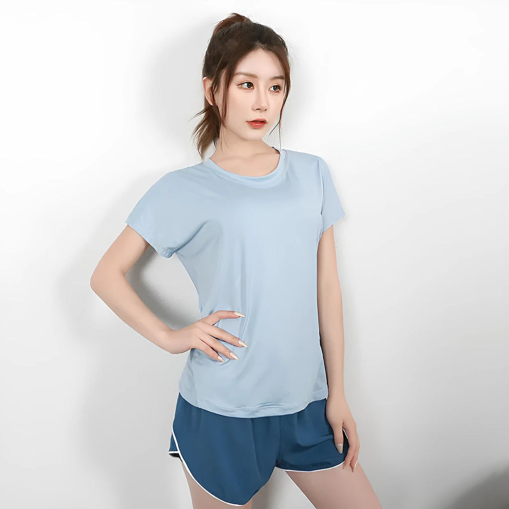 Women's short sleeve polyester sports t-shirt in pink, available in sizes S to XL