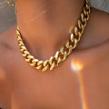 Women's gold electroplated thick chain necklace with 32cm length and solid colour design