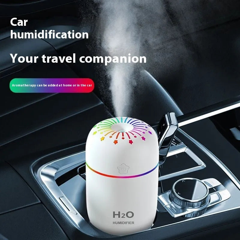 White USB portable mini humidifier with 300ml water tank on desk