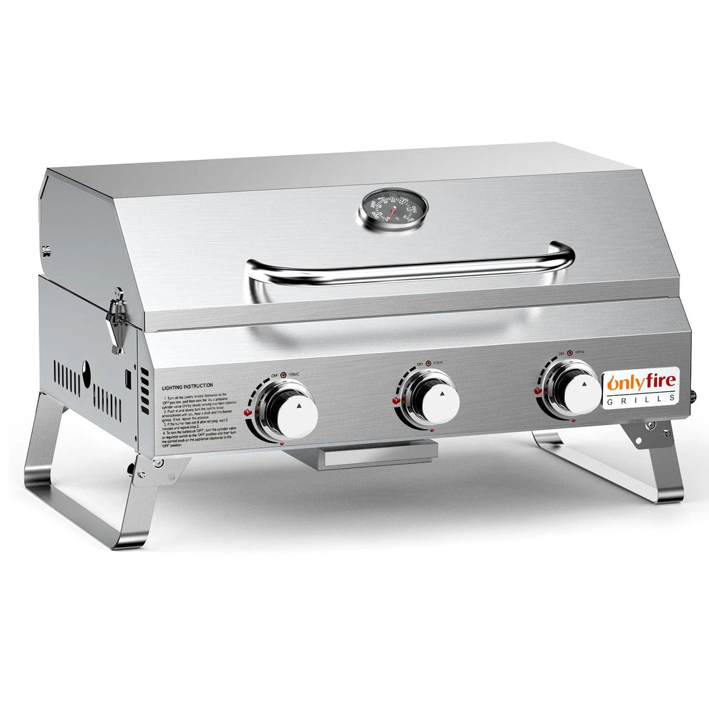 Silver desktop gas barbecue grill with three stainless steel burners and foldable legs