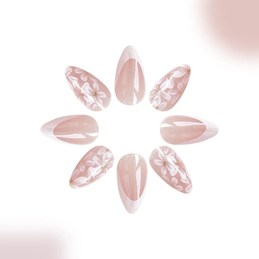Removable artificial nails with French style glitter flowers on short almond shape in colour C625