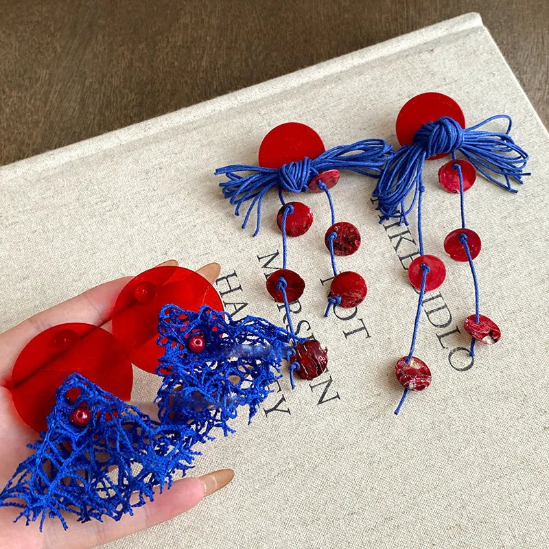 Geometric cloth women's earrings with 30 Silver Needle-blue resin flower colour and round design elements.