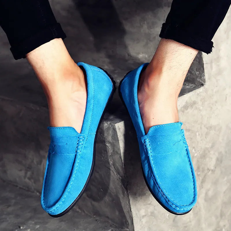 Men's suede casual slip-on shoes in black with round toe and flat rubber sole.