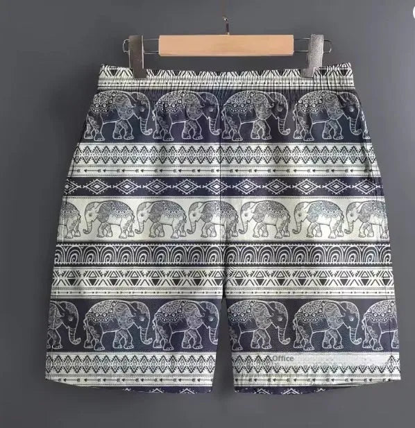 Men's patterned polyester sports shorts on a hanger, showing camouflage and stripe design options.