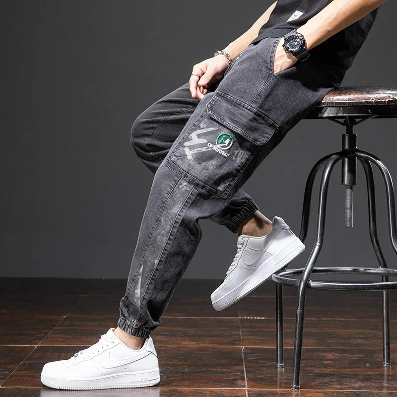 Man wearing loose fit straight leg cargo jeans in blue, showcasing the Korean style and micro-elastic cotton fabric.