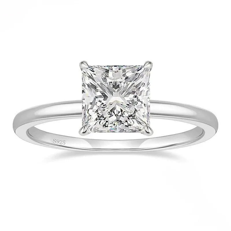 Women's simple geometric sterling silver ring with round zirconium stone in silver, gold, or rose gold colour.