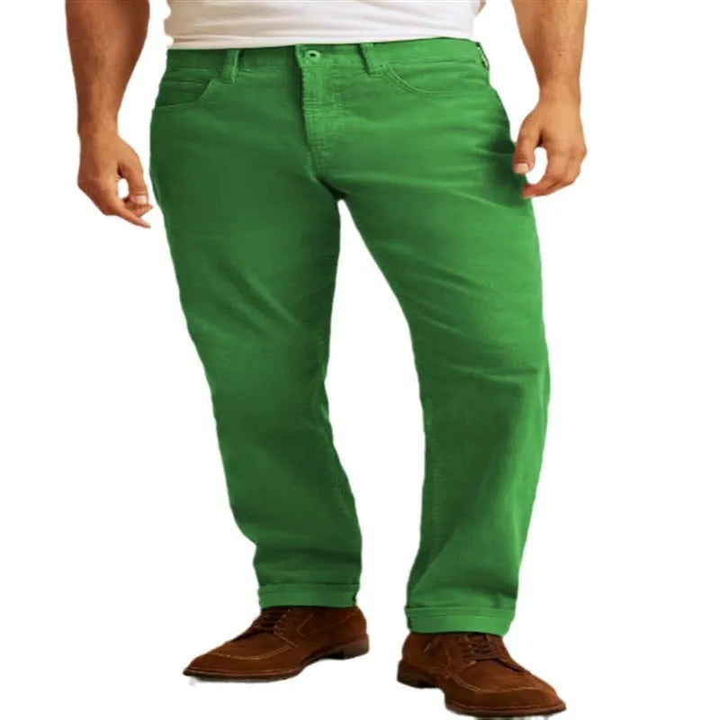 Straight leg corduroy trousers in army green colour, showing loose fit and zip fly detail.