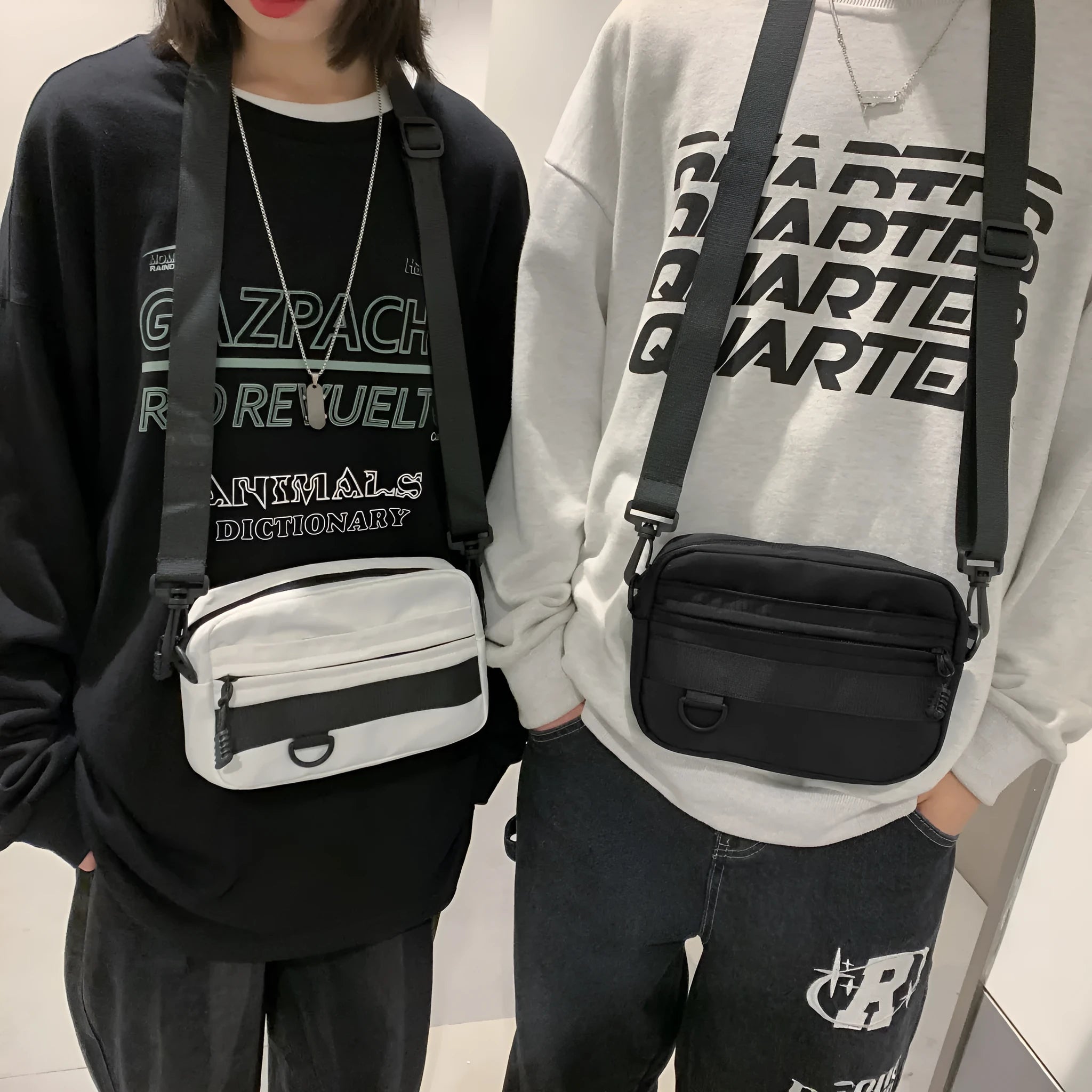 Men's nylon messenger bag in black showing street trend styling with sewing thread details and crossbody strap