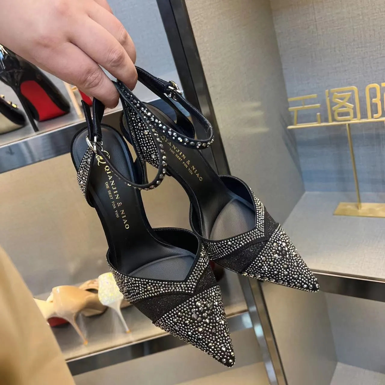 Women's hollow high heels with red sole, pointed toe stiletto design in black and silver colour options