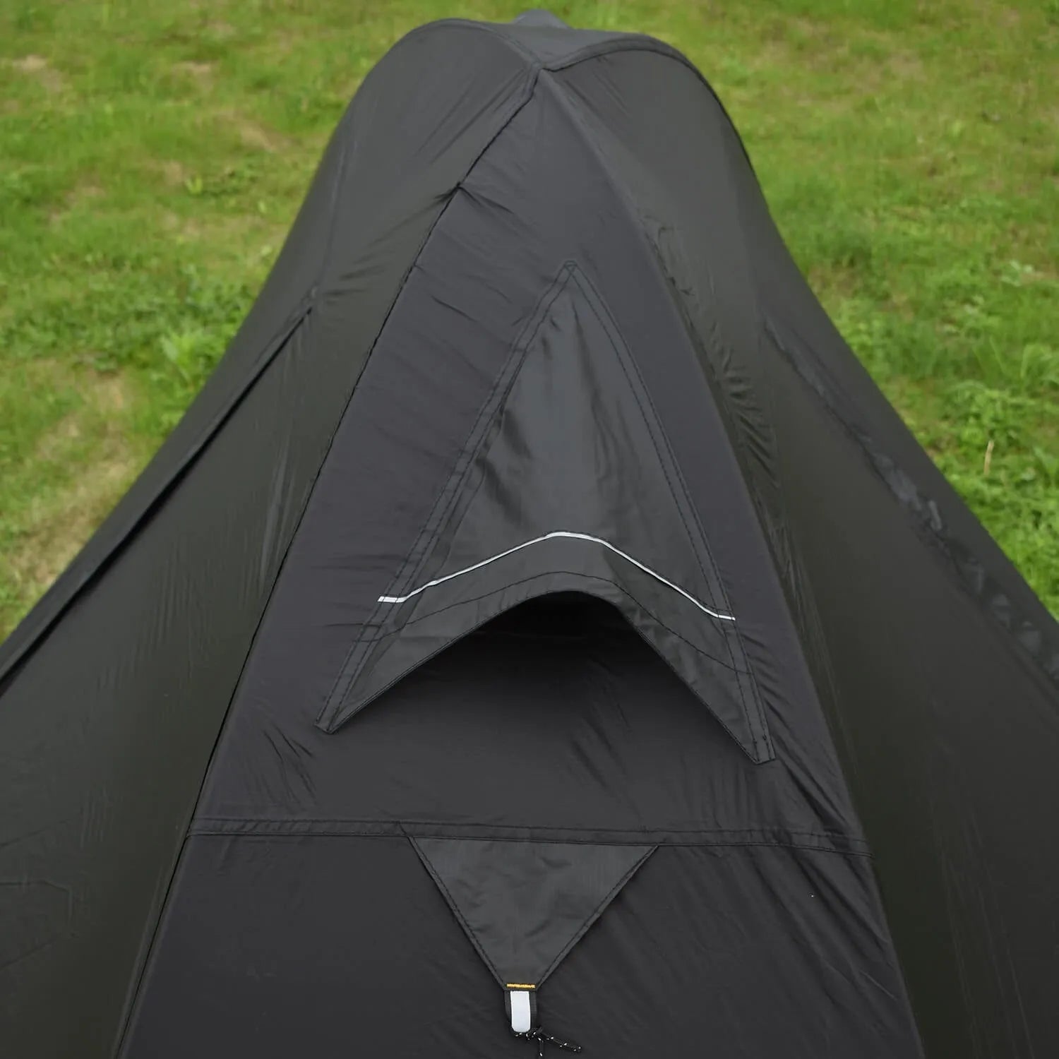 Single person lightweight camping tent with aluminium poles in red colour showing double-layer construction